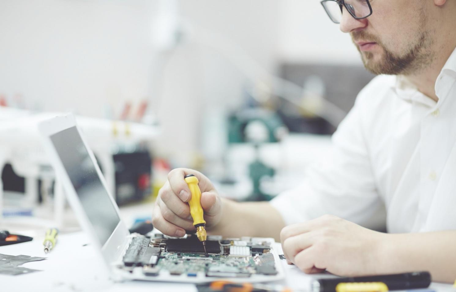 Business professionals analyzing blockchain implementation data and market trends